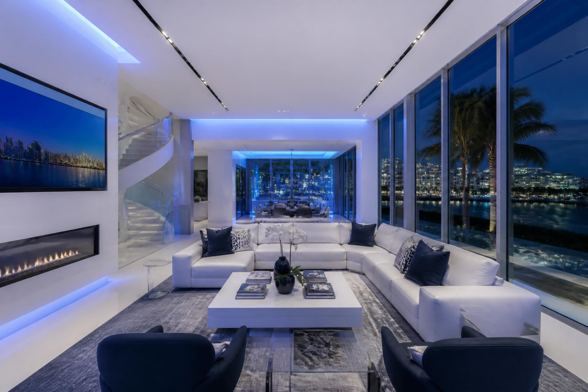 Immaculate modern luxury Miami living room at dusk